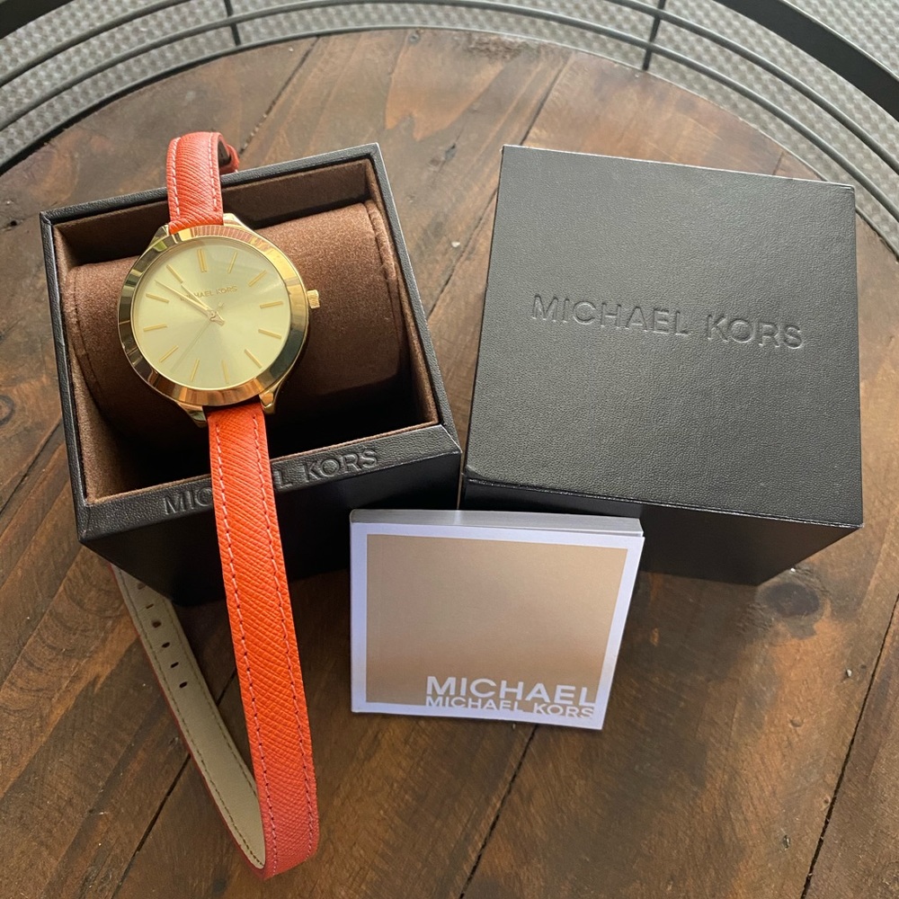 Michael Kors wrap around watch in gold and orange